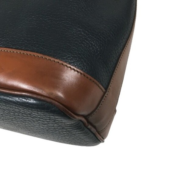 Dooney Bourke AWL Pebbled Leather Drawstring Hobo Bucket Navy Brown Shoulder Bag - Picture 8 of 16